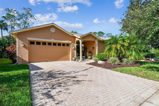 single story home featuring a garage