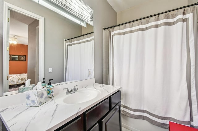 bathroom with vanity and walk in shower