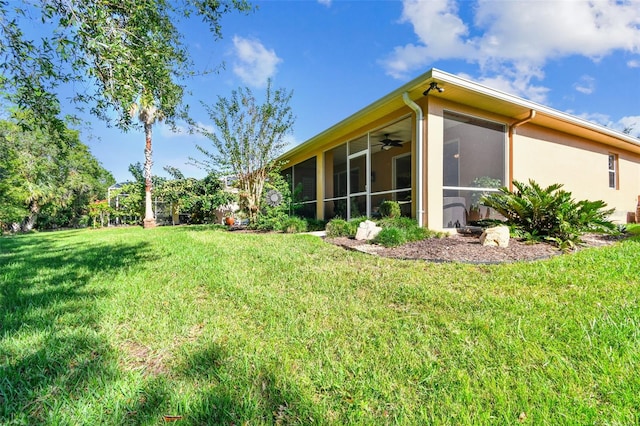 view of yard with a sunroom