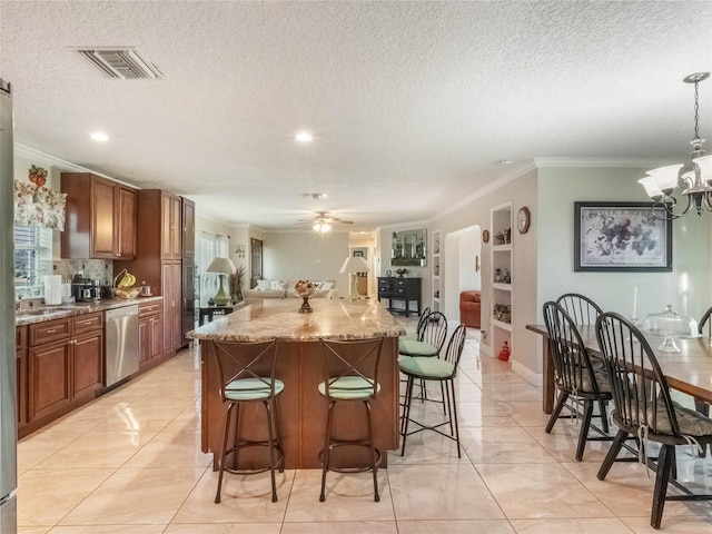 kitchen with dishwasher, ceiling fan with notable chandelier, a large island, ornamental molding, and a breakfast bar