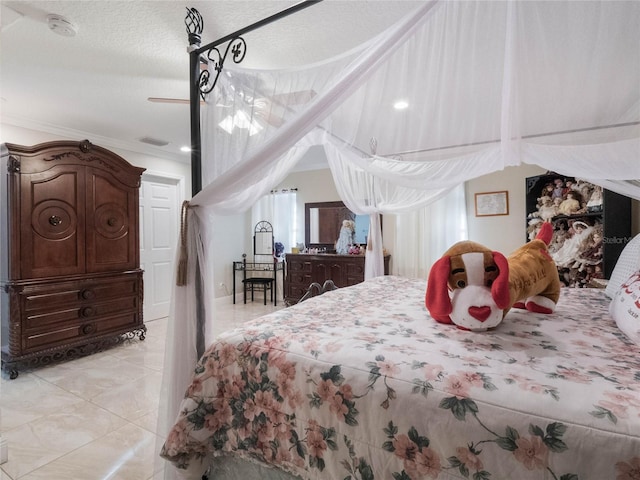 tiled bedroom with ornamental molding and a textured ceiling