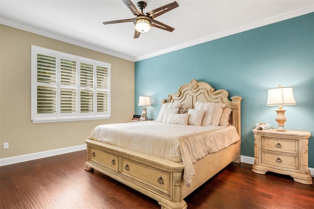 bedroom with dark wood-type flooring, ceiling fan, and ornamental molding