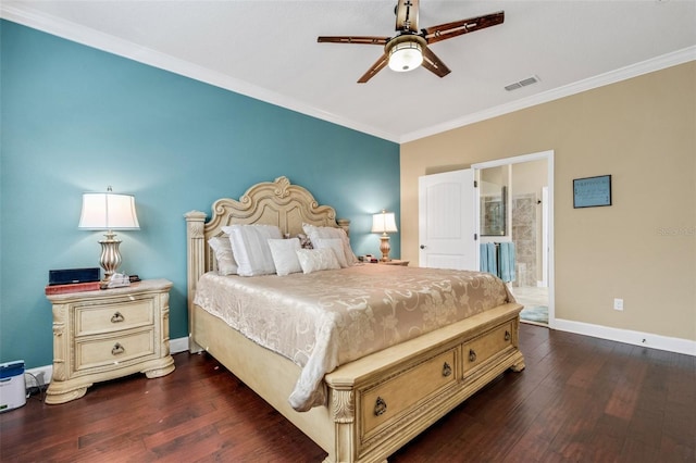 bedroom featuring crown molding, ensuite bathroom, dark hardwood / wood-style floors, and ceiling fan