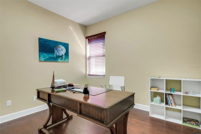 home office with dark wood-type flooring