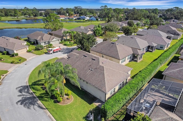 bird's eye view with a water view