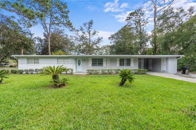 ranch-style home with a carport and a front lawn