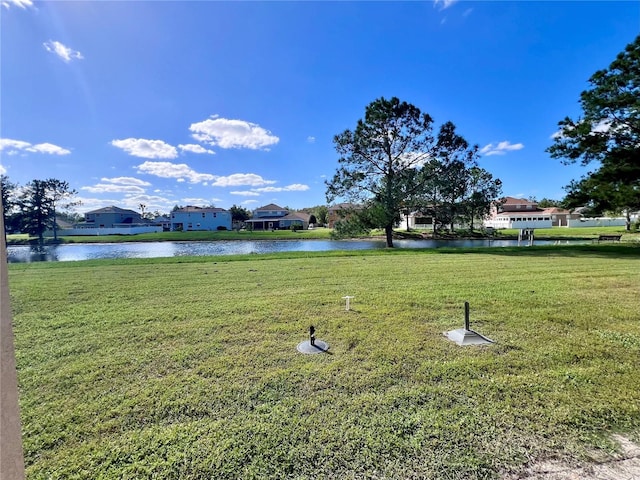 view of yard featuring a water view