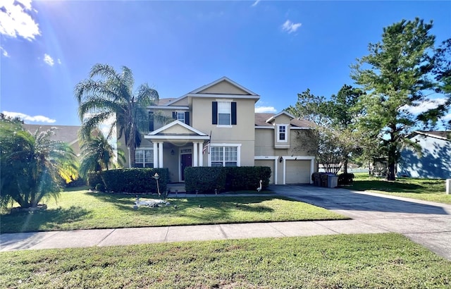 front of property with a front lawn and a garage