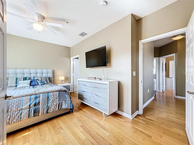 bedroom featuring ceiling fan and light hardwood / wood-style floors