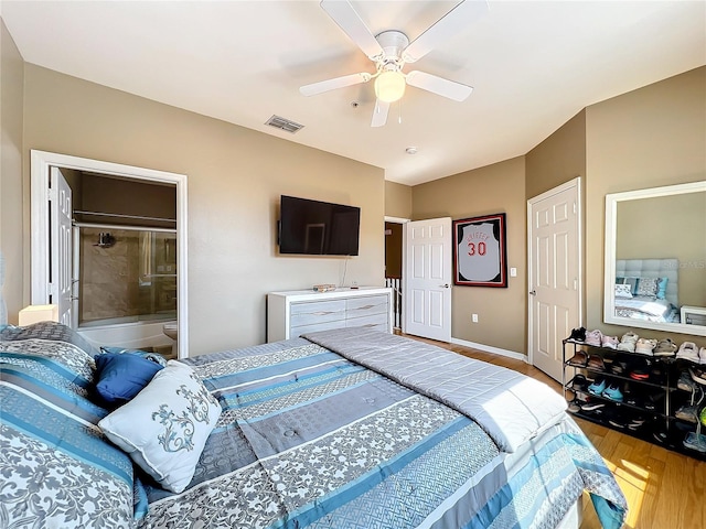 bedroom with ceiling fan and light hardwood / wood-style floors