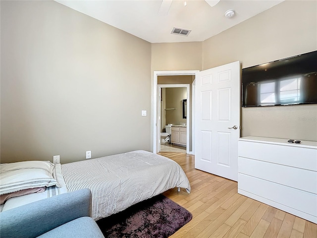 bedroom with ceiling fan and light hardwood / wood-style floors