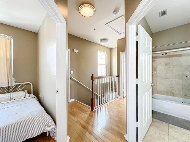 bedroom with light wood-type flooring