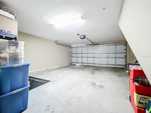 garage featuring a garage door opener