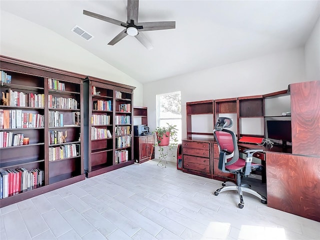 office featuring vaulted ceiling and ceiling fan