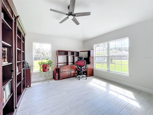 office space featuring light hardwood / wood-style floors and ceiling fan