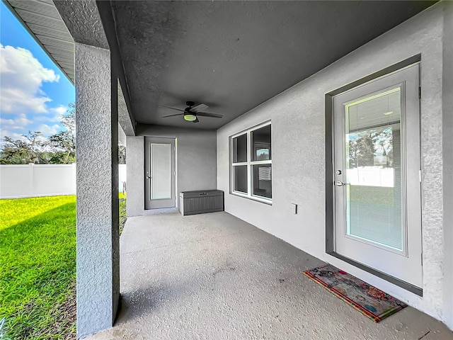 view of patio with ceiling fan