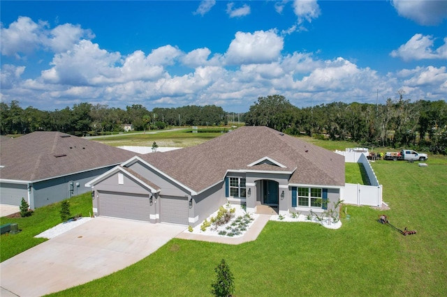 single story home with a front yard and a garage