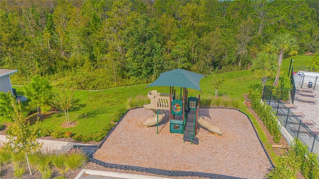 view of playground featuring a lawn