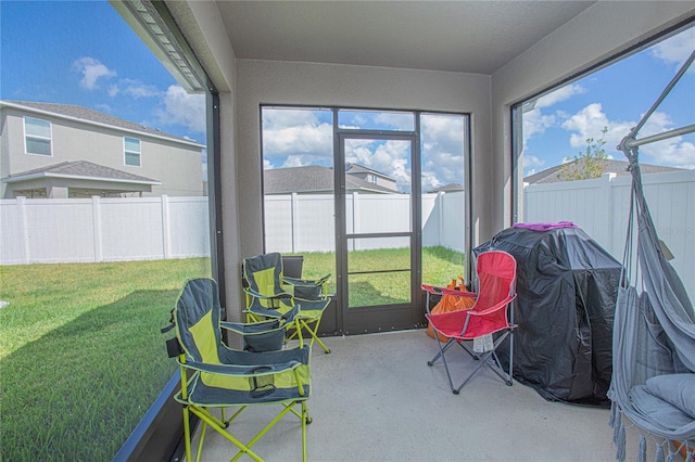 sunroom / solarium with plenty of natural light