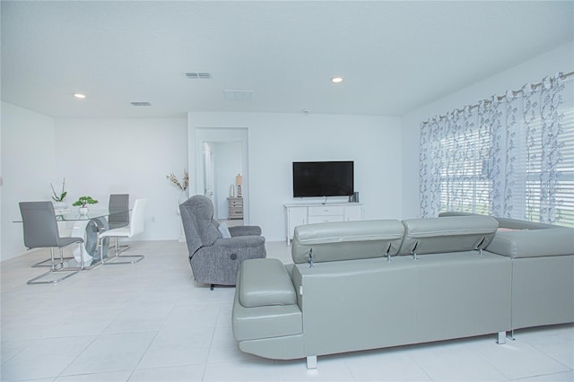 living room featuring light tile patterned flooring