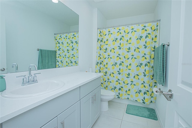 bathroom with vanity, toilet, tile patterned floors, and a shower with shower curtain