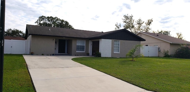 ranch-style house with a front yard