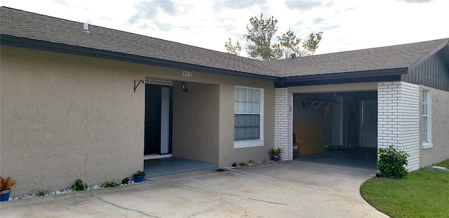 entrance to property featuring a garage