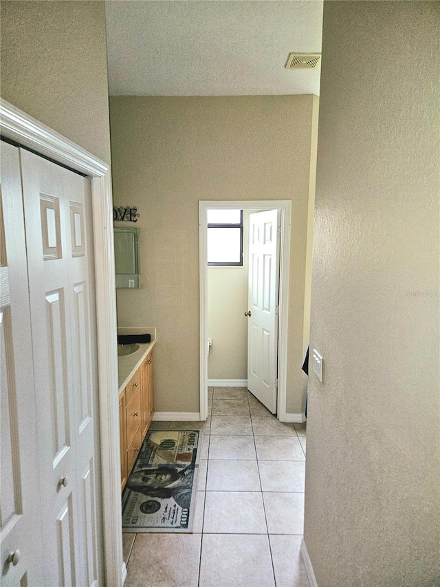 bathroom featuring tile patterned floors