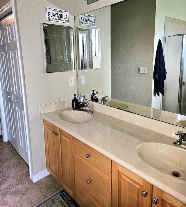 bathroom featuring vanity and tile patterned floors