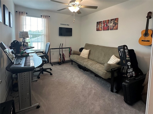 home office with carpet flooring and ceiling fan