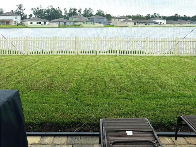 view of yard featuring a water view