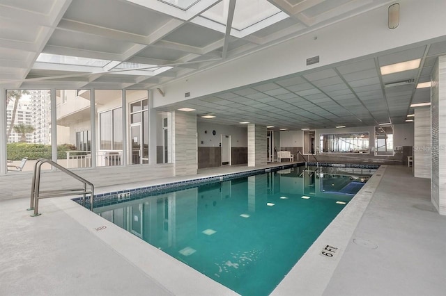 view of pool featuring a patio and a lanai