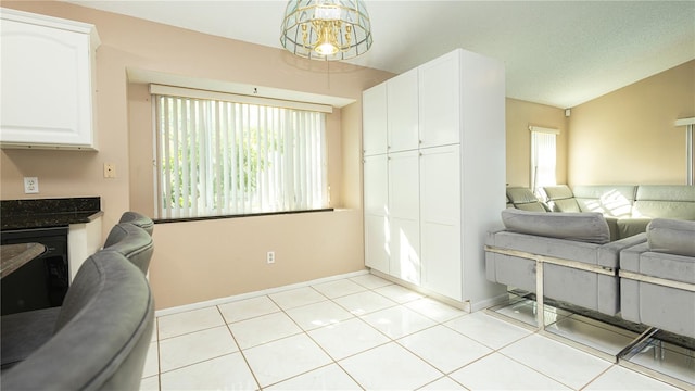 interior space featuring vaulted ceiling