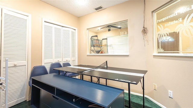 223 Lake Davenport Ests, Davenport, FL 33897 - dining room featuring a desk, a ceiling fan, and a textured ceiling