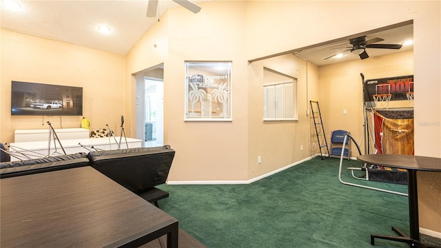 office featuring ceiling fan, carpet flooring, and vaulted ceiling