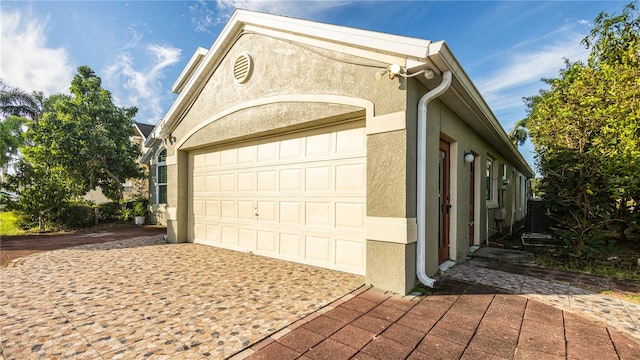 view of home's exterior with a garage