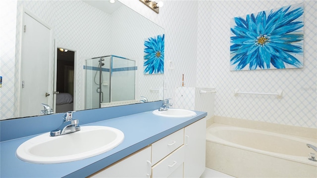 223 Lake Davenport Ests, Davenport, FL 33897 - ensuite bathroom with a shower stall, a bath, double vanity, and wallpapered walls