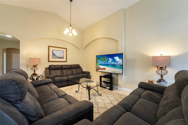 living room featuring high vaulted ceiling, a notable chandelier, and light tile patterned flooring