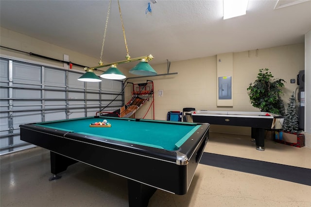 playroom featuring pool table, electric panel, and a textured ceiling