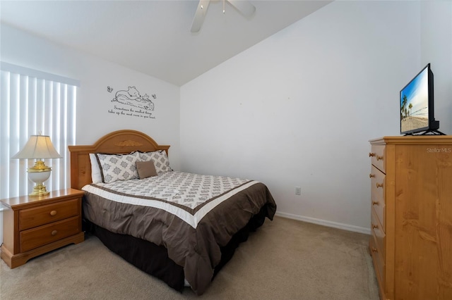 bedroom featuring light colored carpet, ceiling fan, and lofted ceiling