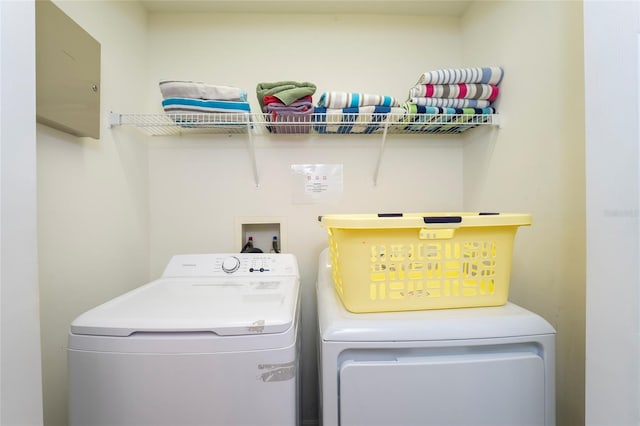 laundry room featuring washing machine and dryer