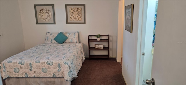 bedroom with dark carpet