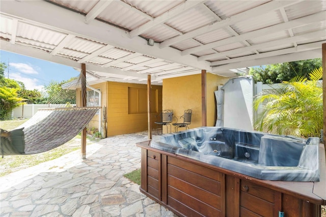 view of patio / terrace featuring fence