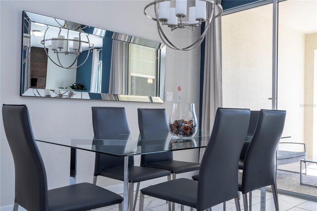 dining room featuring a notable chandelier