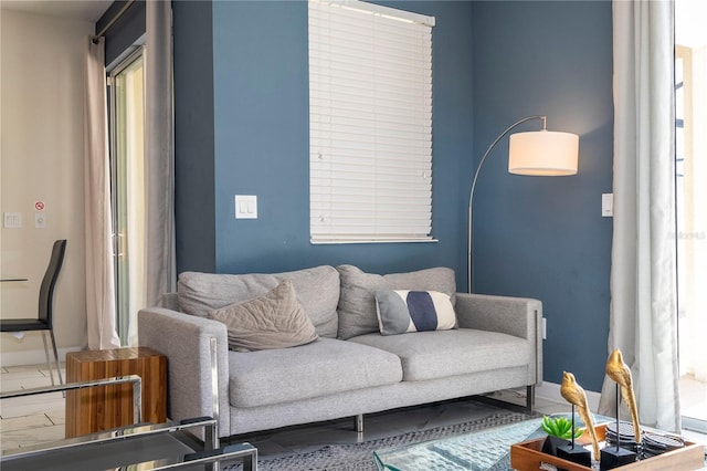 living room featuring baseboards