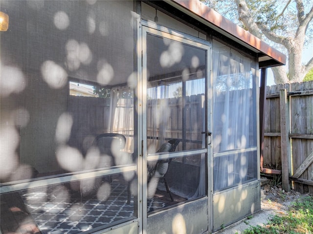 exterior space featuring a sunroom