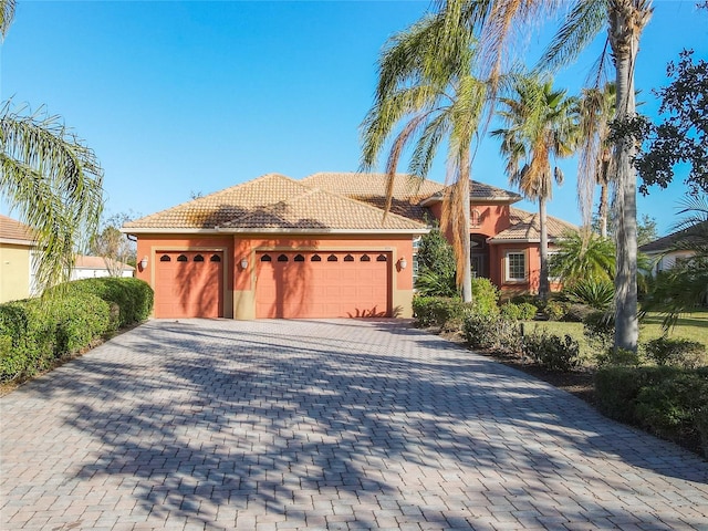 view of front of property featuring a garage