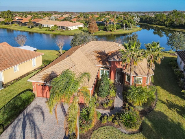 drone / aerial view with a water view