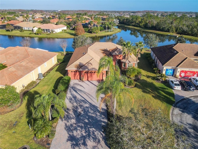 bird's eye view with a water view