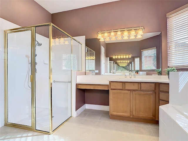 bathroom with tile patterned flooring, vanity, and a shower with door